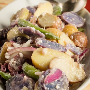 Elegant Events & Custom Catering - Baby tri-colored potatoes in a garlic lemon sauce sprinkled with pecorino romano cheese - Caterers Near Me - Stuart, Florida Elegant Events & Custom Catering - Baby tri-colored potatoes in a garlic lemon sauce sprinkled with pecorino romano cheese - Caterers Near Me - Stuart, Florida