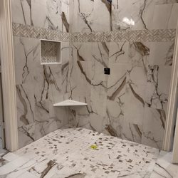 Master Tilesetter - Beautiful walking shower, bench and recessed box.
