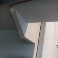 Cash & Carry Kitchens - Material covers doors melts if near heat