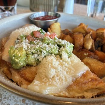 The Henry - Egg white turkey omelette with breakfast potatoes - New American Near Me - Phoenix, Arizona The Henry - Egg white turkey omelette with breakfast potatoes - New American Near Me - Phoenix, Arizona