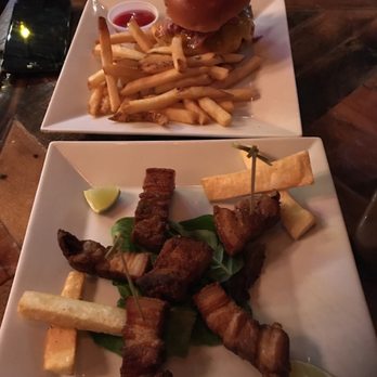 Salud Bar & Grill - Burger with fries & chicarron with yuca fries - Latin American Near Me - Brooklyn, New York Salud Bar & Grill - Burger with fries & chicarron with yuca fries - Latin American Near Me - Brooklyn, New York