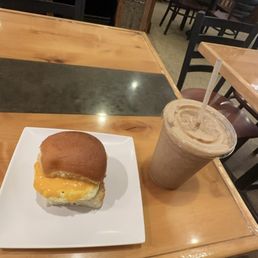 Breakfast Sandwich w/ sausage paired with the 16 oz. Kick Starter Smoothie