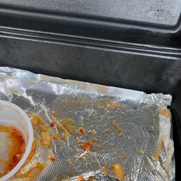 a half eaten meal in foil a half eaten meal in foil