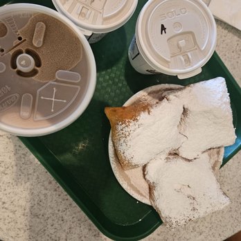 Cafe Du Monde - Beignets + frozen au lait - Coffee & Tea Near Me - New Orleans, Louisiana Cafe Du Monde - Beignets + frozen au lait - Coffee & Tea Near Me - New Orleans, Louisiana