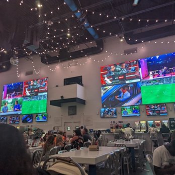 The Hangout - Overhang of market lights and two flat screen televisions - Burgers Near Me - Myrtle Beach, South Carolina The Hangout - Overhang of market lights and two flat screen televisions - Burgers Near Me - Myrtle Beach, South Carolina