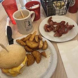 Egg sandwich with ham! Side of bacon Egg sandwich with ham! Side of bacon