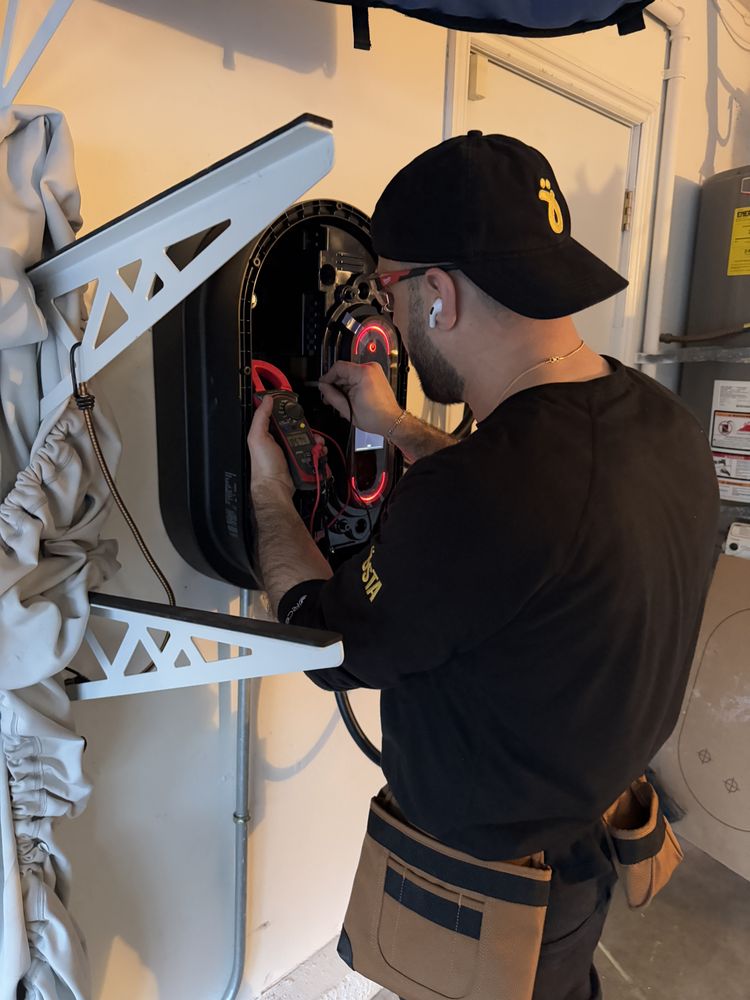 Slide of OC Electricians, by Osta