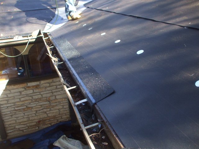 Slide of Ruddy's Roofing