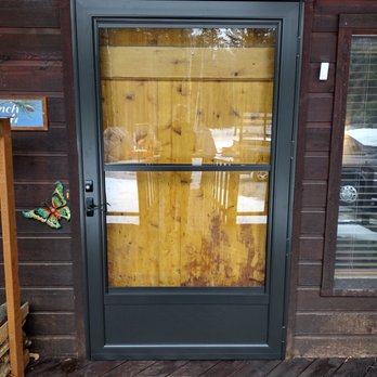 Hilton Glass & Door - Custom sized bronze storm door. 48 x 84 in size. - Windows Installation Near Me - Sandpoint, Idaho Hilton Glass & Door - Custom sized bronze storm door. 48 x 84 in size. - Windows Installation Near Me - Sandpoint, Idaho