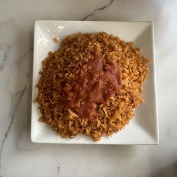 Bisi African Restaurant - Jollof rice - IG @bougiefoodieboi - African Near Me - Schaumburg, Illinois