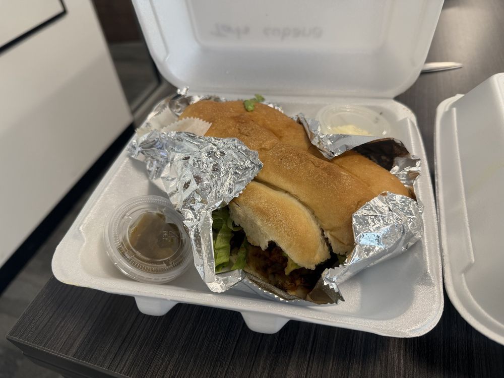 Taqueria Rancho El Milagro Logo