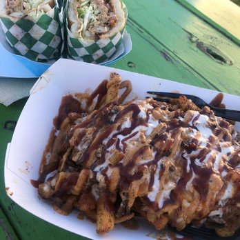 A Moveable Feast - Pulled pork over Cajun Fries & shrimp + crab sandwich. - New American Near Me - Lodi, California