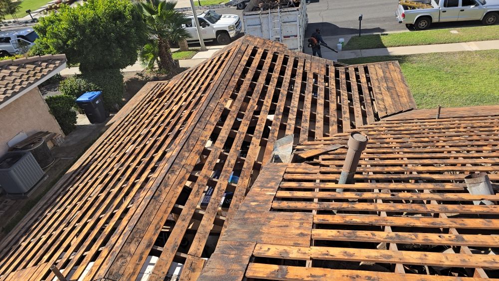 Slide of Kalli Roofing