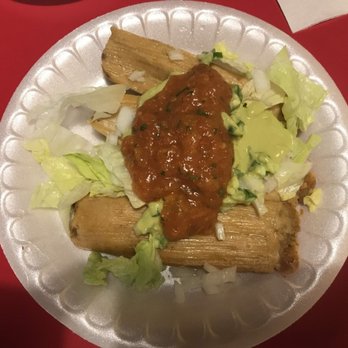 Delia's - Tamales with lettuce, hot red salsa, and creamy green salsa - Mexican Near Me - Mission, Texas