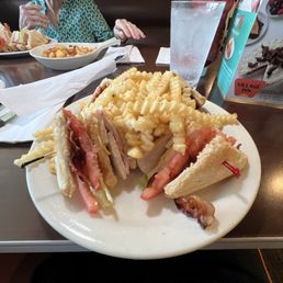 Double-decker turkey club with fries Double-decker turkey club with fries