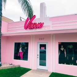 Vixen by Micheline Pitt - Our new location with our restored vintage Art Deco inspired building and Nights of Neon Vixen sign.