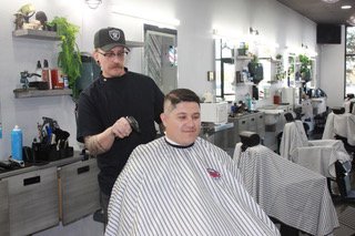 The Original Barbershop Eastern Logo