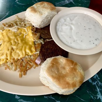Mel's Diner - Biscuits and gravy with loaded hash browns. - American Near Me - Dyersburg, Tennessee Mel's Diner - Biscuits and gravy with loaded hash browns. - American Near Me - Dyersburg, Tennessee