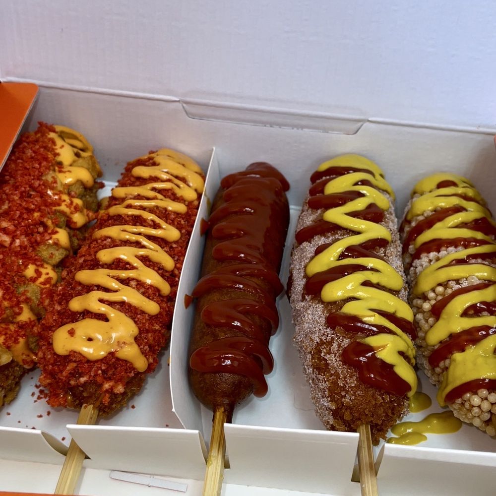 hotdogs with mustard and ketchup hotdogs with mustard and ketchup
