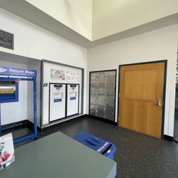 US Post Office - Picture of box for flat stamped and letters located inside of the Post Office.