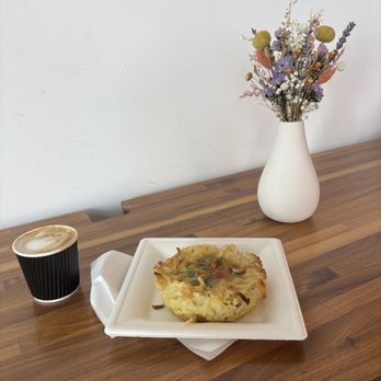 Northern Roots Coffeehouse - Cortado and hash brown quiche - Coffee & Tea Near Me - Greensboro, North Carolina Northern Roots Coffeehouse - Cortado and hash brown quiche - Coffee & Tea Near Me - Greensboro, North Carolina