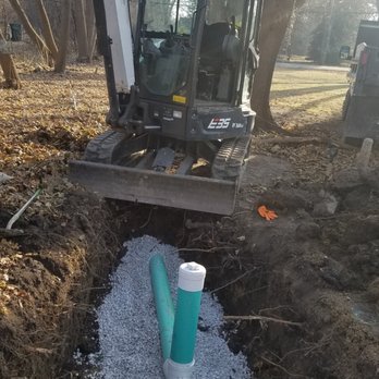 Absolute Plumbing  - Installing the clean out in sewer line - Plumbing Near Me