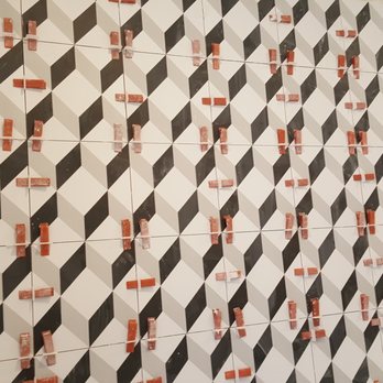 Sig Tile - a black and white tiled wall - Flooring Near Me Sig Tile - a black and white tiled wall - Flooring Near Me