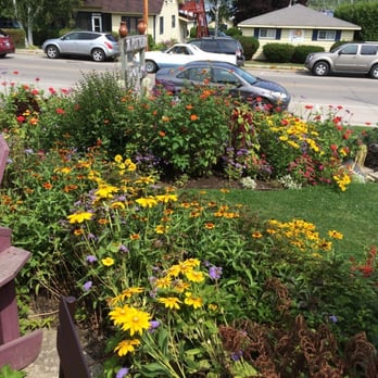 TR Pottery - Flower garden in front of store. - Art Galleries Near Me - Fish Creek, Wisconsin