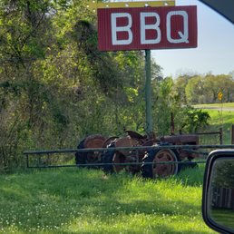 a bbq sign in the background a bbq sign in the background