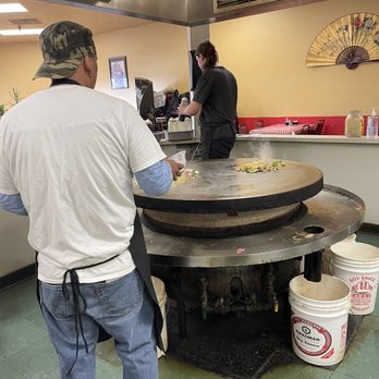 Mongolian Grill - two men preparing food in a kitchen - Chinese Near Me - Idaho Falls, Idaho Mongolian Grill - two men preparing food in a kitchen - Chinese Near Me - Idaho Falls, Idaho