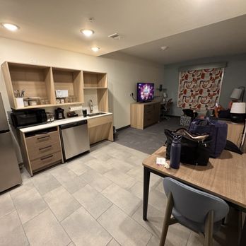 Home2 Suites by Hilton Hernando - Living area with kitchenette - Hotels Near Me - Hernando, Mississippi Home2 Suites by Hilton Hernando - Living area with kitchenette - Hotels Near Me - Hernando, Mississippi