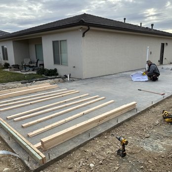 Axis One Construction - a concrete patio being built - General Contractors Near Me