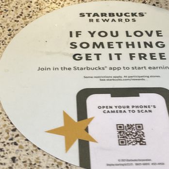 Starbucks - a starbucks reward sticker on a table - Coffee & Tea Near Me - Miami, Florida Starbucks - a starbucks reward sticker on a table - Coffee & Tea Near Me - Miami, Florida
