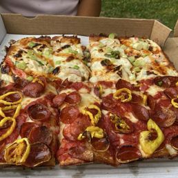 Half Eugene half Mario on thick crust. Soooo good! Half Eugene half Mario on thick crust. Soooo good!