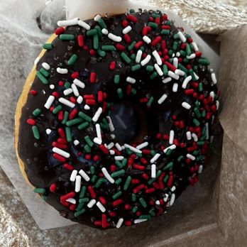 Morr Donuts - Chocolate-glazed doughnut with Christmas sprinkles - Donuts Near Me - Mechanicsville, Virginia Morr Donuts - Chocolate-glazed doughnut with Christmas sprinkles - Donuts Near Me - Mechanicsville, Virginia