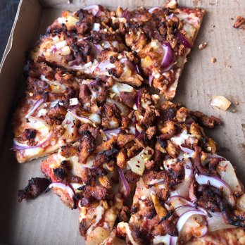 Oscar's Grill - This is the left over gluten free pizza- topped full of delicious pastore pork, fresh pineapple, and onions. Crispy crust. So good. - Pizza Near Me - Isla Mujeres, ROO Oscar's Grill - This is the left over gluten free pizza- topped full of delicious pastore pork, fresh pineapple, and onions. Crispy crust. So good. - Pizza Near Me - Isla Mujeres, ROO