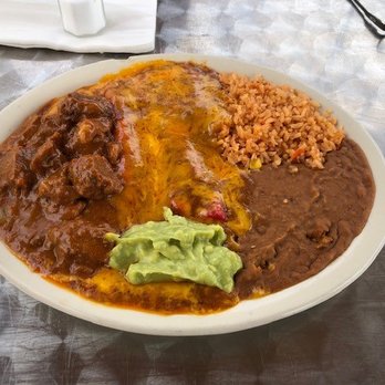 El Norteno Express  - 11. Texas Plate: Carne Guisada, 2 cheese enchiladas covered with gravy, rice, beans, guac & 2 tortillas. - Mexican Near Me - New Braunfels, Texas
