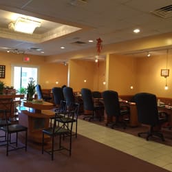 Lins Charming Nail Spa - Plenty of nail stations Ina comfortable setting.
