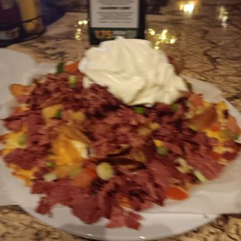 McMullan's Irish Pub - 1/15/2025.  Irish Nachos with corned beef ($14 + $8, or $7 + $8 during happy hour): sounds better than it tasted, 3.5/5 stars. - Irish Near Me - Las Vegas, Nevada