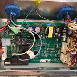 Raynor Appliance Service - This is the board that needed replacing. 8 connectors to be removed from the failed board, & reattached to the new one. Took me 10 mins.