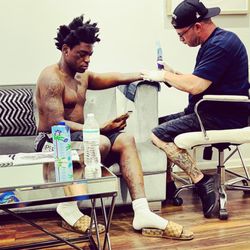 Mob Ink Tattoos - Kodak Black and Tattoo Danny from Mob Ink . 
Kodak Knows where to go when he wants the best !