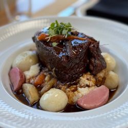 Red Wine Braised Shortrib, Anson Mills Cheesy Grits, Pearl Onions