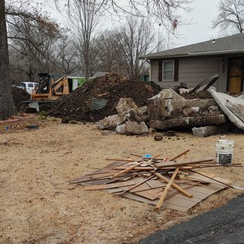 DC Solutions - Moving out basement walls out.  Yard during. - Waterproofing Near Me - Paola, Kansas