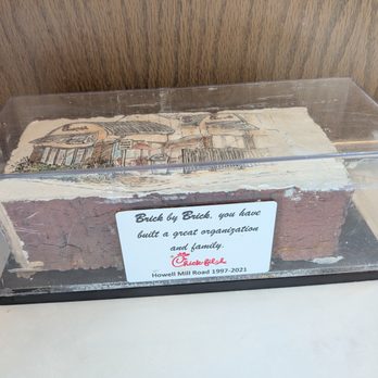 Chick-fil-A - I believe this is a brick from the original Chick-fil-A Howell Mill building that stood from 1997 to 2021. - Fast Food Near Me - Atlanta, Georgia Chick-fil-A - I believe this is a brick from the original Chick-fil-A Howell Mill building that stood from 1997 to 2021. - Fast Food Near Me - Atlanta, Georgia