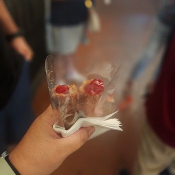 Mr Churro - a person holding a piece of food - Bakeries Near Me - Los Angeles, California Mr Churro - a person holding a piece of food - Bakeries Near Me - Los Angeles, California