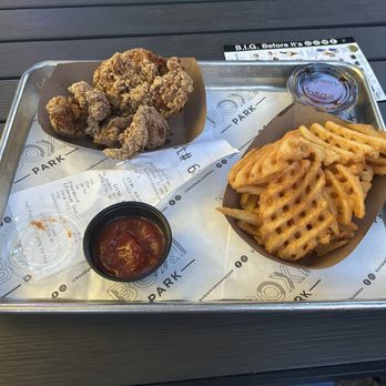 Boxi Park - Crispy Chicken Tenders, Waffle Fries, and Ketchup Sauce. - Bars Near Me - Orlando, Florida