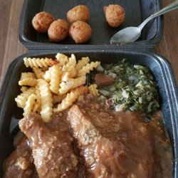 Wayne's Grocery - Chicken gravy & rice, fries, turnip greens and hush puppies. We got a breast, leg and thigh.