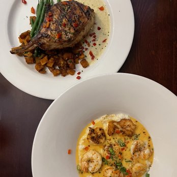 Muriel's Jackson Square - Wood Grilled Pork Chop (top) & Shrimp & Grits (bottom) - Cajun/Creole Near Me - New Orleans, Louisiana Muriel's Jackson Square - Wood Grilled Pork Chop (top) & Shrimp & Grits (bottom) - Cajun/Creole Near Me - New Orleans, Louisiana