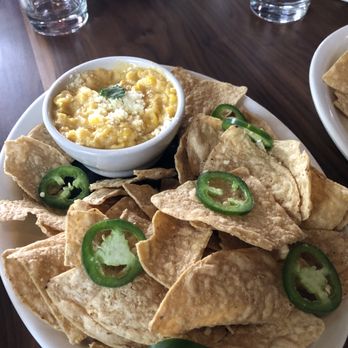 Champions Austin Restaurant & Bar - Chips with Jalapeños and corn dip - New American Near Me - Austin, Texas