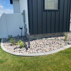 Western Landscaping and Decorative Curbing - Curbing and rock beds